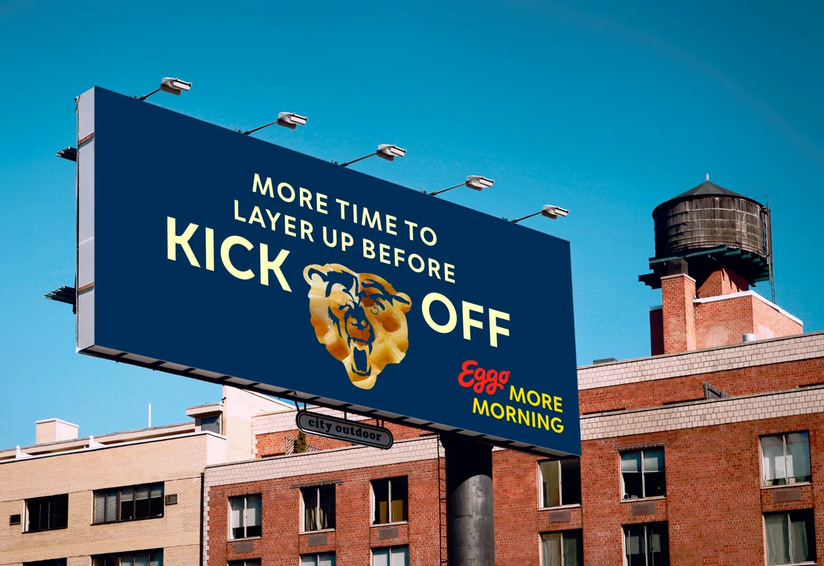 Rooftop billboard: “More time to layer up before kickoff,” with a bear’s head made of waffle
